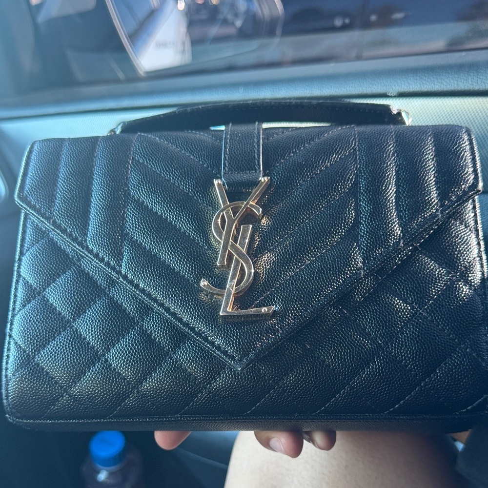Yves Saint Laurent Black Quilted Clutch with Gold Logo